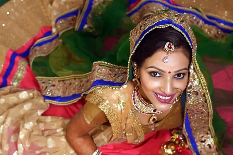 Indian bride looking up at camera