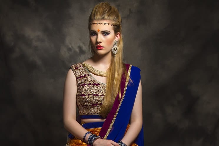 Caucasian woman dressed in Hindu wedding clothes