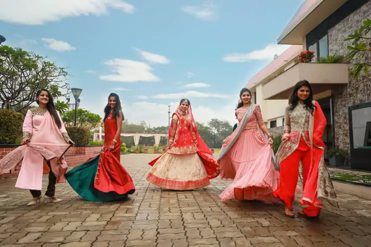 Indian women wearing different dresses for indian wedding